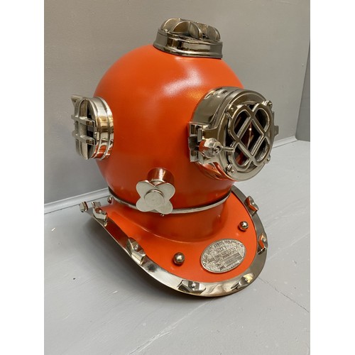 432 - DISPLAY DIVING HELMET, decorative reproduction US Navy design, lacquered orange finish, 46cm x 46cm ... 