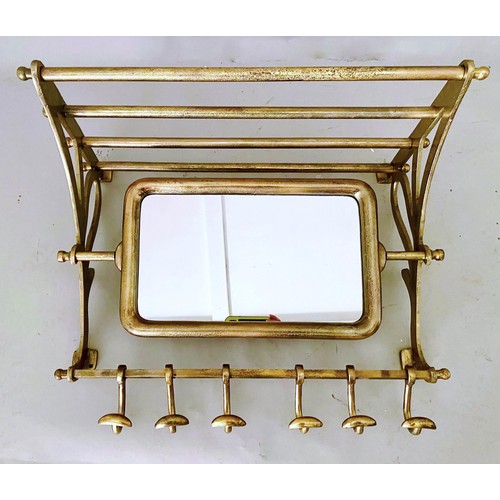 446 - WALL MOUNTING LUGGAGE RACK, with articulating mirror and row of coat hooks to base, gilt metal, 54cm... 