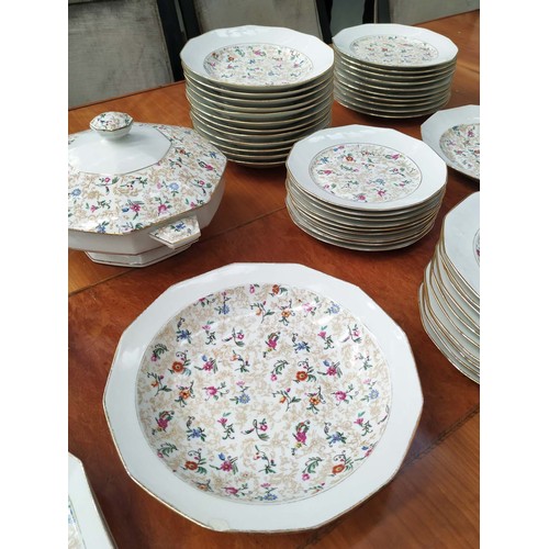 12 - LOURIOUX PART DINNER SET, comprising 20 plates, 9 smaller plates, 6 soup dishes, comport low comport... 