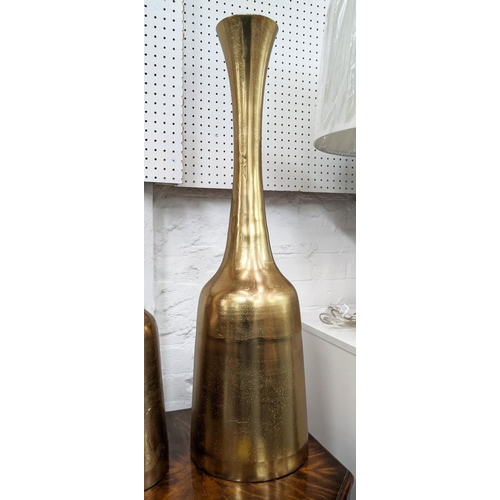 450 - BOTTLE VASES, a graduated pair, gilt metal, 69cm H. (2)