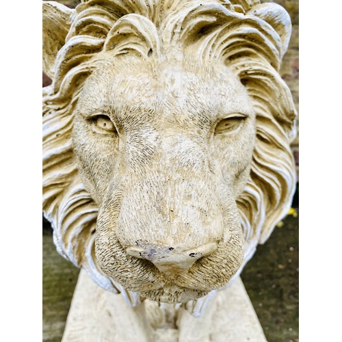 440 - SCULPTURAL LIONS, a pair, composite stone, 67cm H x 42cm W x 54cm D. (2)