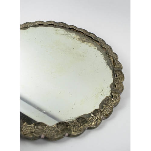 2 - OTTOMAN SILVER REPOUSSE MIRROR, with foliate decoration and mounted bird, 28cm diam.