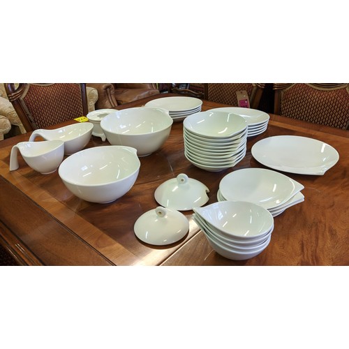 69 - VILLEROY AND BOCH 'FLOW' PART DINNER SERVICE, white porcelain including ten plates, ten bowls. (Qty)