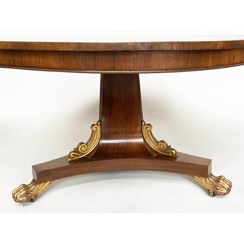 297 - BREAKFAST TABLE, Regency rosewood circular with gilded paw supports, 122cm x 73cm H.