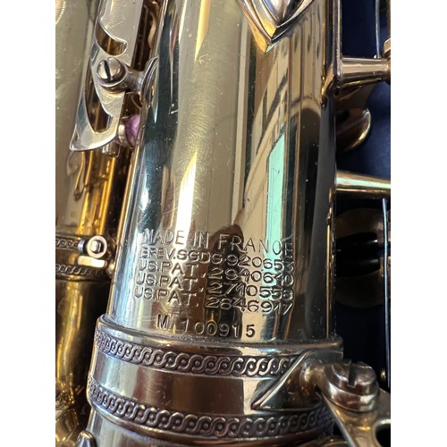 7 - HENRI SELMER BRASS SAXOPHONE, cased.