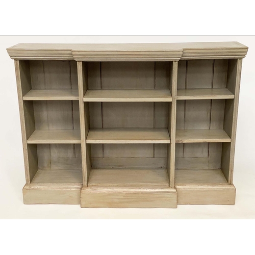 129 - OPEN BOOKCASE, Edwardian painted of breakfront form, 133cm W x 97cm H x 31cm D.