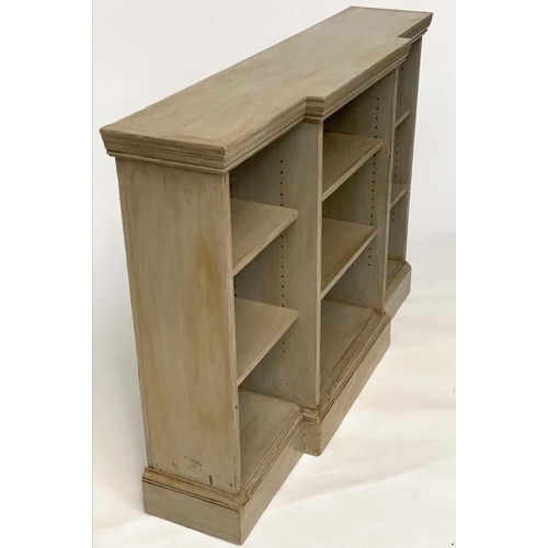 129 - OPEN BOOKCASE, Edwardian painted of breakfront form, 133cm W x 97cm H x 31cm D.