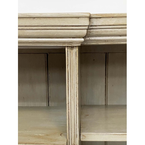 129 - OPEN BOOKCASE, Edwardian painted of breakfront form, 133cm W x 97cm H x 31cm D.