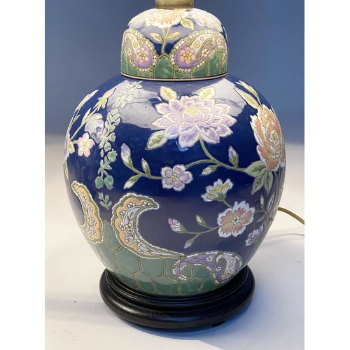 140 - TABLE LAMPS, a pair, Chinese lidded ginger jar form, ceramic with blossom, blue and emerald green gr... 