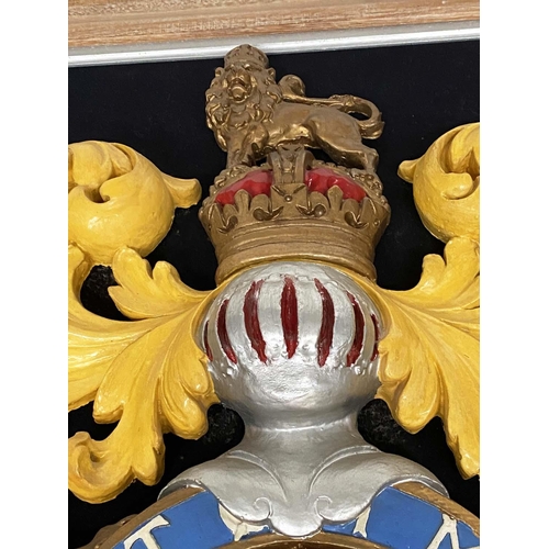 146 - ROYAL COAT OF ARMS, resin modelled and hand painted in limewood and silver slip frame, 84cm W x 94cm... 