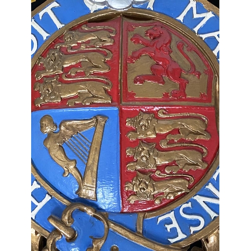 146 - ROYAL COAT OF ARMS, resin modelled and hand painted in limewood and silver slip frame, 84cm W x 94cm... 