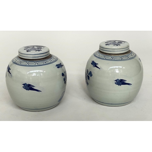 132 - CHINESE GINGER JARS, a pair, Chinese export blue and white ceramic each with lid, 23cm H. (2)