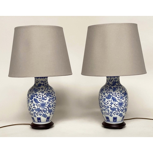 136 - TABLE LAMPS, 75cm H, a pair, Chinese blue and white ceramic of vase form with circular wood bases an... 