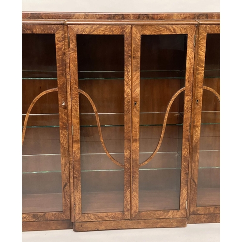 147 - ART DECO DISPLAY CASE, walnut, of breakfront form, with four glazed doors enclosing shelves, 152cm W... 