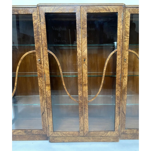 147 - ART DECO DISPLAY CASE, walnut, of breakfront form, with four glazed doors enclosing shelves, 152cm W... 