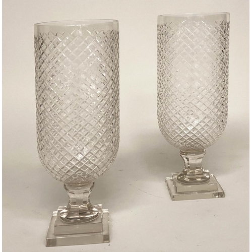 154 - STORM LAMPS, 40cm H, a pair, hand engraved cross hatch vase on facetted column and stepped plinth. (... 