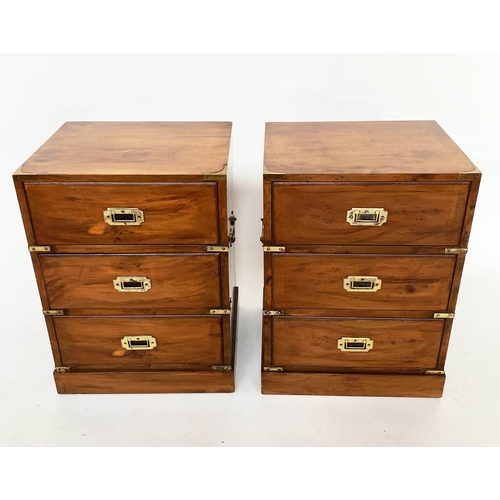 157 - CAMPAIGN STYLE BEDSIDE CHESTS, a pair, yewwood and brass bound each with three drawers, 46cm x 37cm ... 