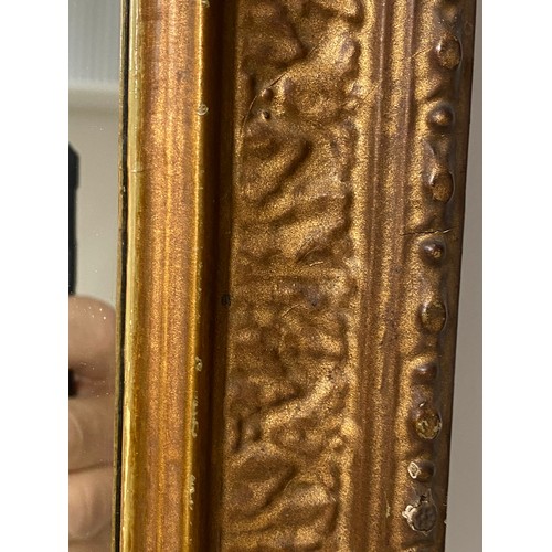 85 - PIER MIRROR, 19th century English giltwood and gesso moulded with beaded frame labelled verso 'T. W.... 