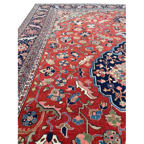 89 - ANTIQUE PERSIAN HERIZ CARPET, 375cm x 290cm.