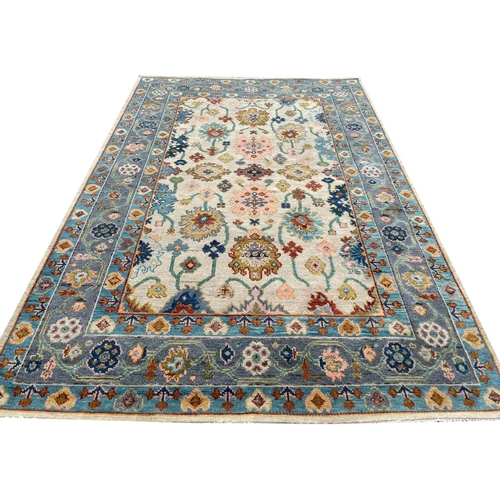 97 - CONTEMPORARY OUSHAK CARPET, 274cm x 179cm.