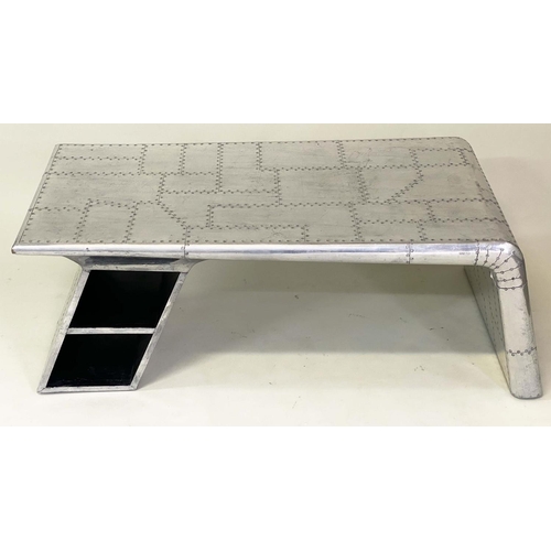 388 - 'SOLO' AVIATOR LOW TABLE, 130cm x 57cm x 47cm H, aluminium, screw panelled, with shelves.