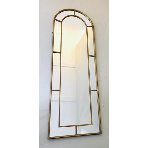 389 - ARCHITECTURAL HALL MIRROR, 180cm H x, 63cm W, arched gilt metal frame.