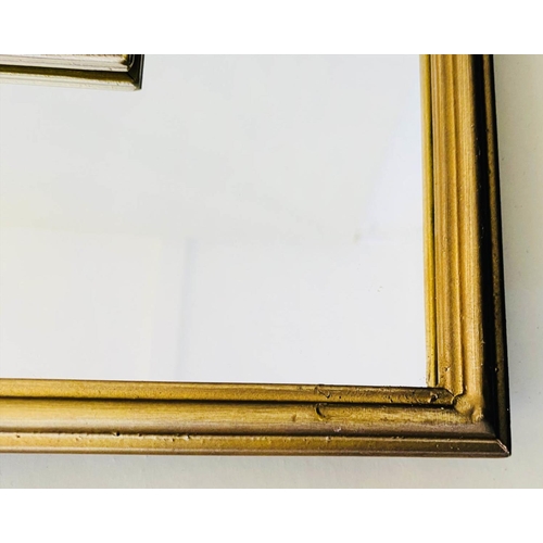 389 - ARCHITECTURAL HALL MIRROR, 180cm H x, 63cm W, arched gilt metal frame.