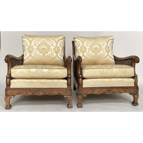 257 - BERGERES, a pair, early 20th century English walnut and gilt framed and cane panelled with silk broc... 