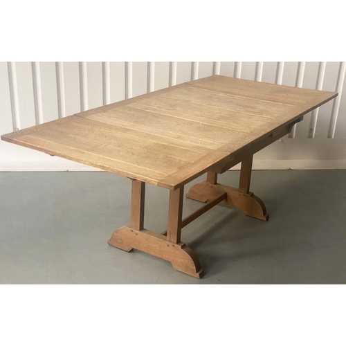 252 - EXTENDING DINING TABLE, early 20th century oak rectangular planked and cleated extending with two le... 