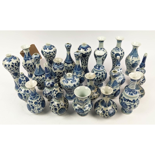 9 - MINIATURE VASES, a collection of twenty five, 17cm approx. at tallest, Chinese export style blue and... 