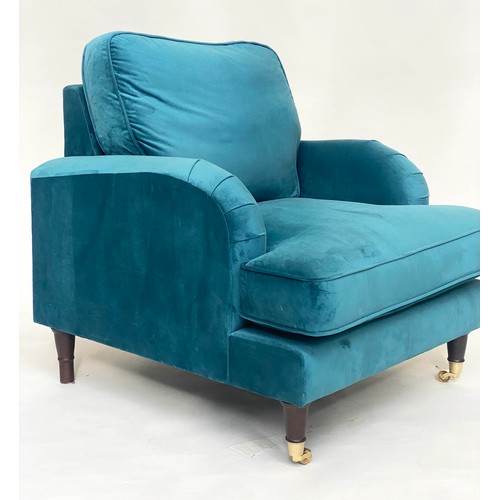 247 - ARMCHAIR, contemporary ocean blue velvet upholstery, with turned front supports and gilt metal casto... 