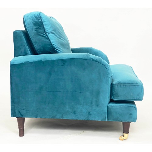 247 - ARMCHAIR, contemporary ocean blue velvet upholstery, with turned front supports and gilt metal casto... 