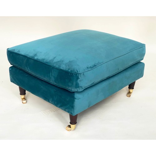 247 - ARMCHAIR, contemporary ocean blue velvet upholstery, with turned front supports and gilt metal casto... 