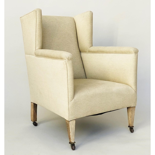 105 - WING ARMCHAIR, Edwardian parchment weave upholstery with tapering supports, 66cm W.