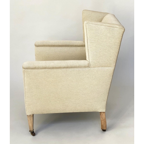 105 - WING ARMCHAIR, Edwardian parchment weave upholstery with tapering supports, 66cm W.