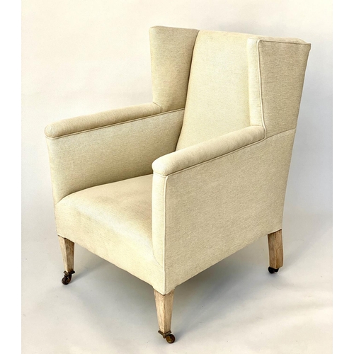 105 - WING ARMCHAIR, Edwardian parchment weave upholstery with tapering supports, 66cm W.