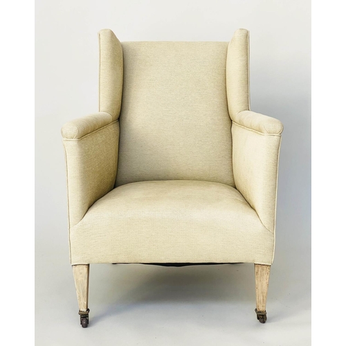 105 - WING ARMCHAIR, Edwardian parchment weave upholstery with tapering supports, 66cm W.