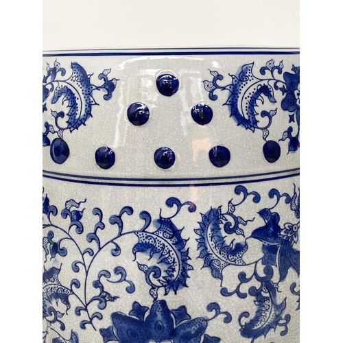 130 - CHINESE STOOL, Chinese ceramic blue and white cracked glaze of pierced barrel form, 45cm H>