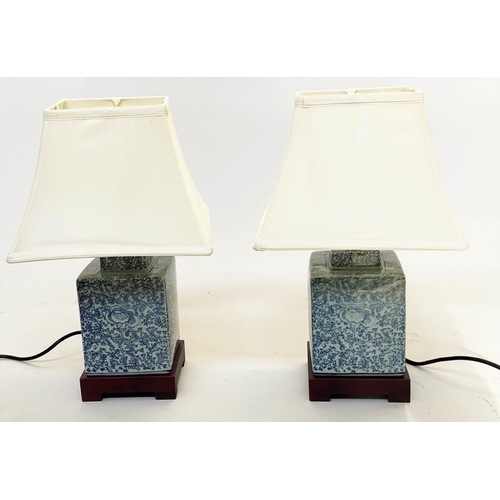 132 - TABLE LAMPS, a pair, 42cm H, Chinese blue and white ceramic of stepped square form with shades. (2)