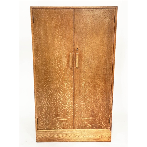 133 - WARDROBE, 1950s oak in the manner of Heals of London with two doors enclosing hanging space and shel... 