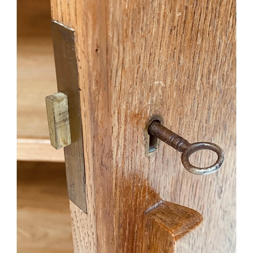 133 - WARDROBE, 1950s oak in the manner of Heals of London with two doors enclosing hanging space and shel... 