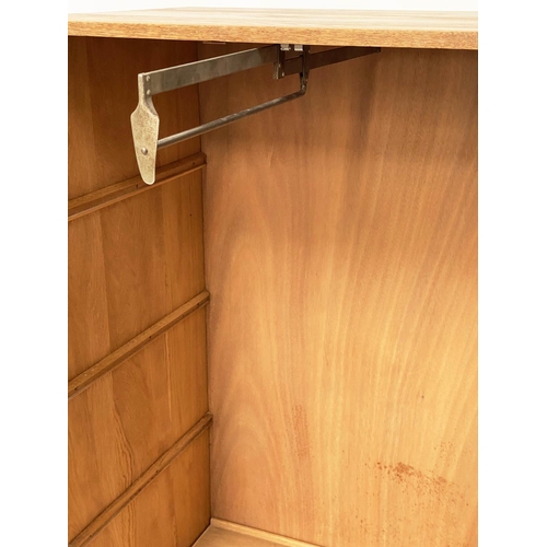 133 - WARDROBE, 1950s oak in the manner of Heals of London with two doors enclosing hanging space and shel... 