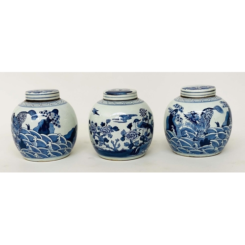 134 - CHINESE JARS, a set of three Chinese blue and white ceramic lidded jar form, 25cm H. (3)