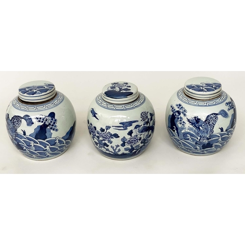 134 - CHINESE JARS, a set of three Chinese blue and white ceramic lidded jar form, 25cm H. (3)