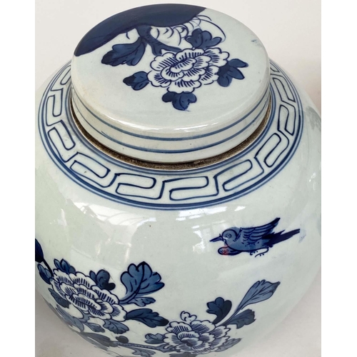 134 - CHINESE JARS, a set of three Chinese blue and white ceramic lidded jar form, 25cm H. (3)