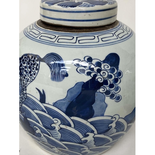 134 - CHINESE JARS, a set of three Chinese blue and white ceramic lidded jar form, 25cm H. (3)