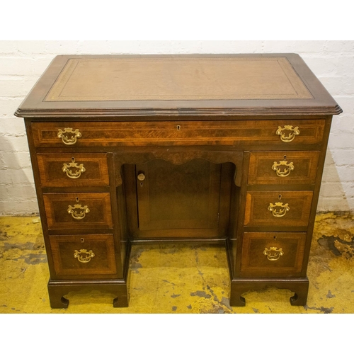 143 - KNEEHOLE DESK, 75cm H x 92cm x 56cm, early 20th century walnut and featherbanded with brown leather ... 