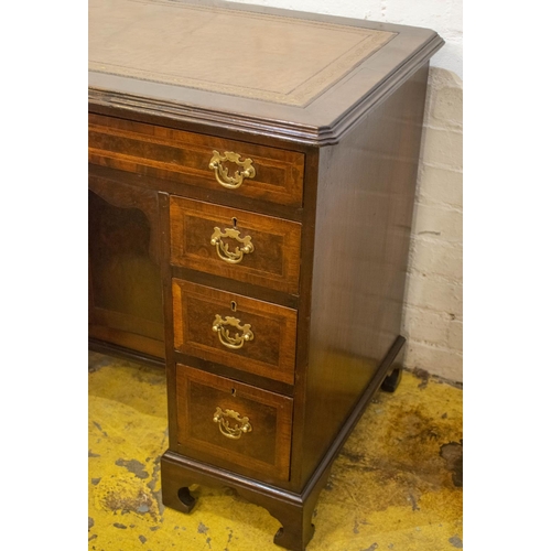 143 - KNEEHOLE DESK, 75cm H x 92cm x 56cm, early 20th century walnut and featherbanded with brown leather ... 