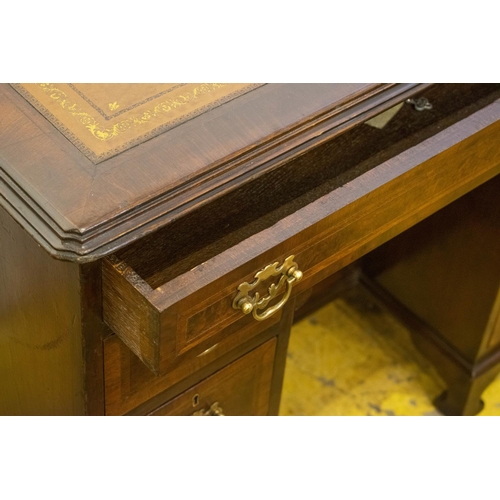 143 - KNEEHOLE DESK, 75cm H x 92cm x 56cm, early 20th century walnut and featherbanded with brown leather ... 