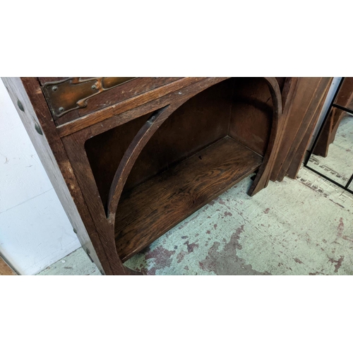 175 - ARTS AND CRAFTS BOOKCASE, early 20th century oak with leaded glazed doors, copper hinges and shelves... 